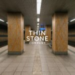 Bidasar Brown - Rainforest brown marble veneer used on subway pillars