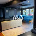 Metallic gold stone veneer art decor used on restaurant counter