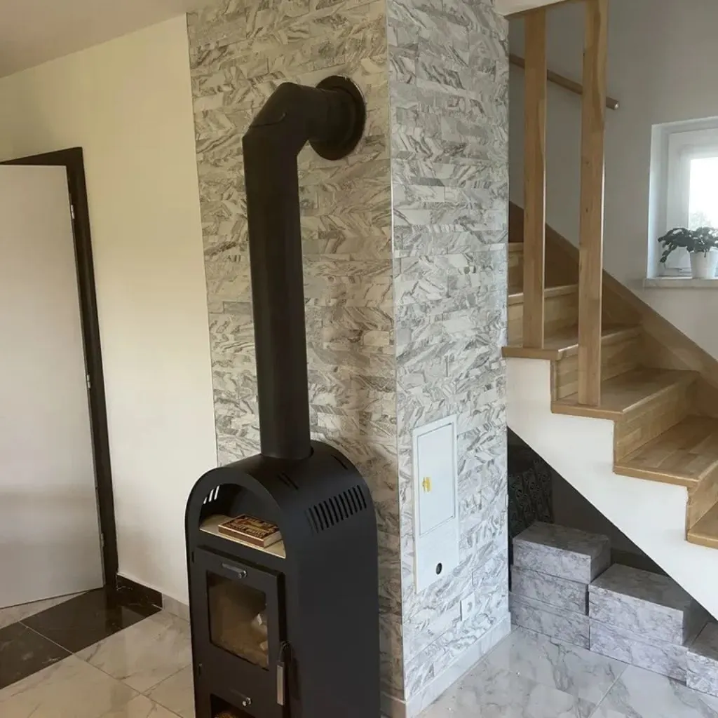 Arctic Storm peel & Stick 3D wall panel made by Ryan Stone Creations on a fireplace